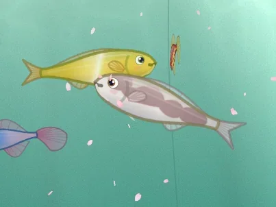A yellow koi and a gray-and-white koi swimming together in the Zen Pond tank.