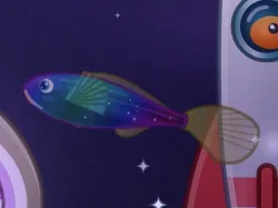 A rainbow-colored fish with a long tail in the Nebula Reef tank.